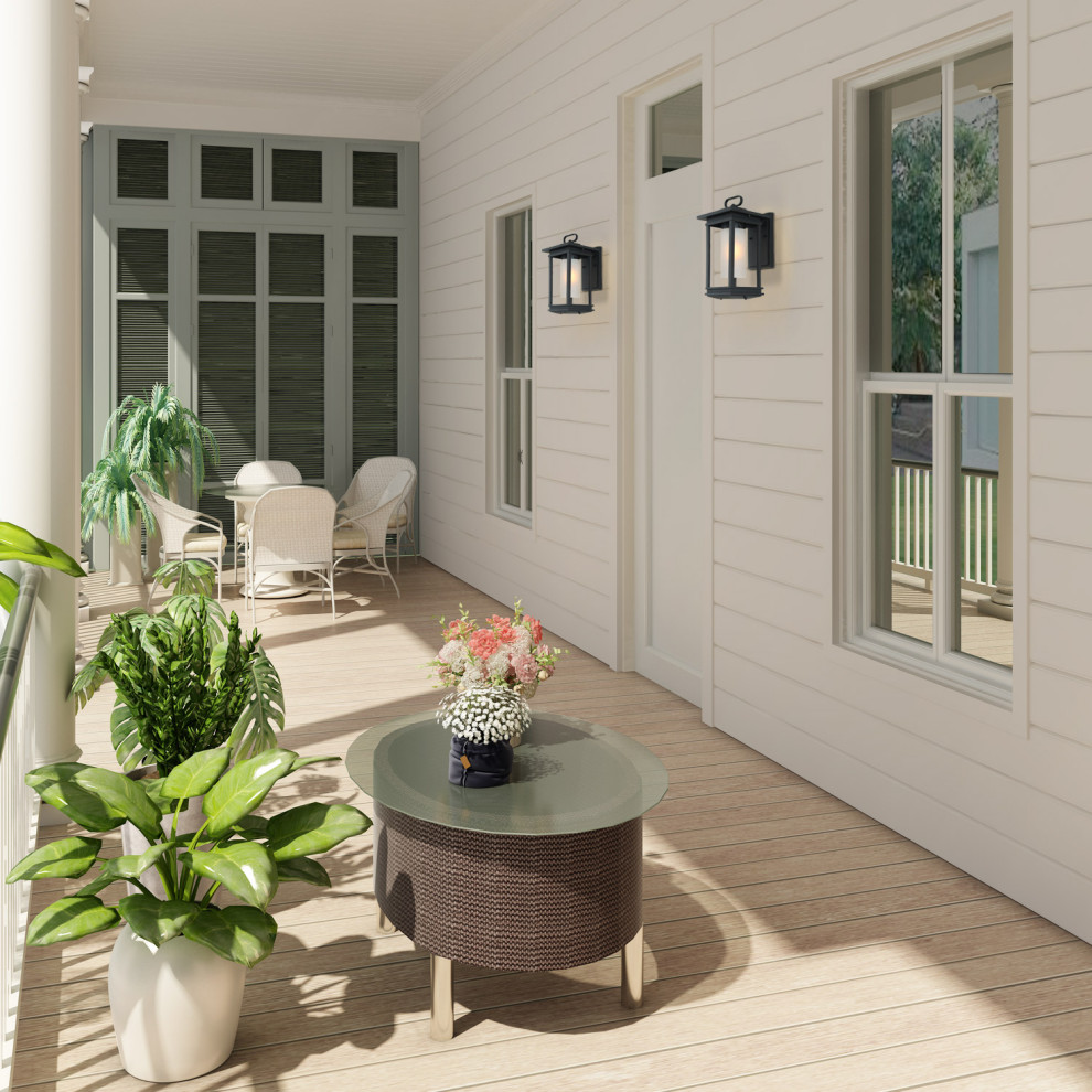 Idée de décoration pour un petit porche avec des plantes en pot avant tradition avec une terrasse en bois et une extension de toiture.
