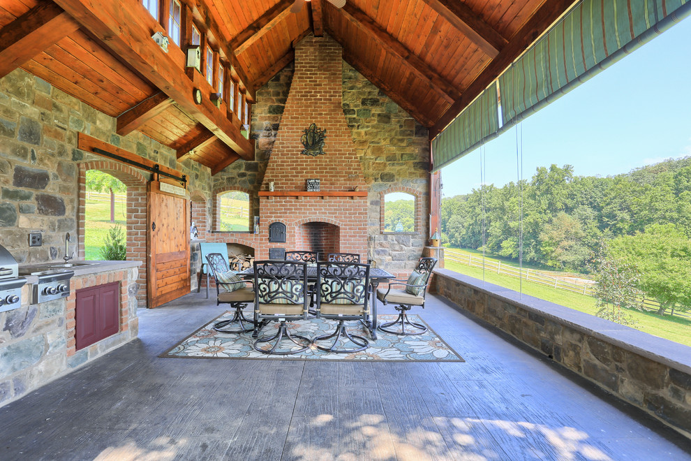 This is an example of a farmhouse porch design in Philadelphia.