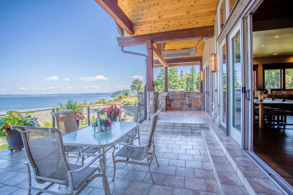 This is an example of a beach style veranda in Seattle.