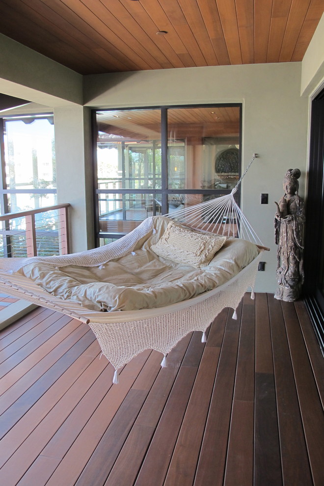 This is an example of an eclectic porch design in Other.
