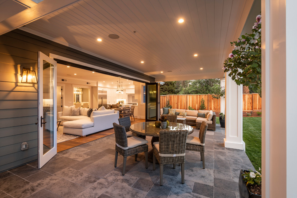 Traditional back patio in San Francisco with natural stone paving.