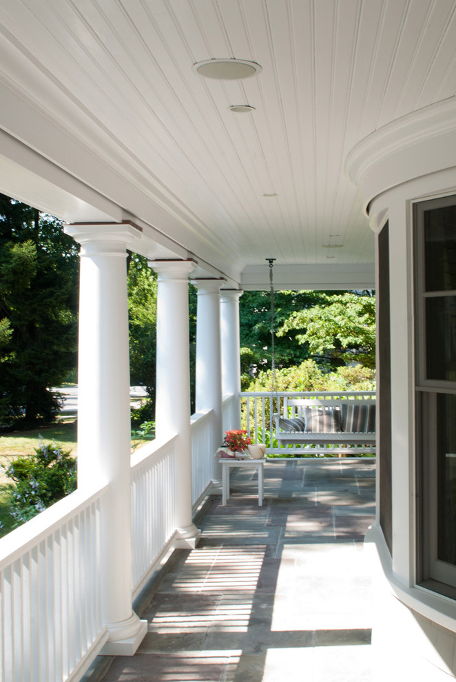 Ornate front porch photo in New York