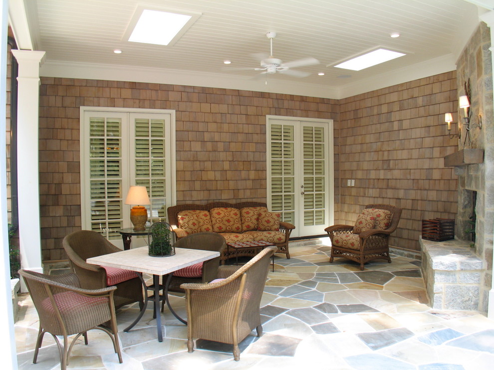This is an example of a classic veranda in Atlanta with feature lighting.