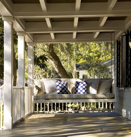 Here are 25 farmhouse porch swings for a welcoming and cozy entry way! All the farmhouse porch swing ideas you need in one place!