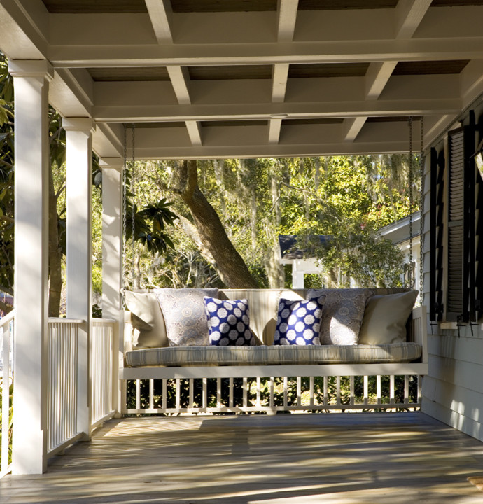 Mid-sized elegant front porch photo in Atlanta with a roof extension