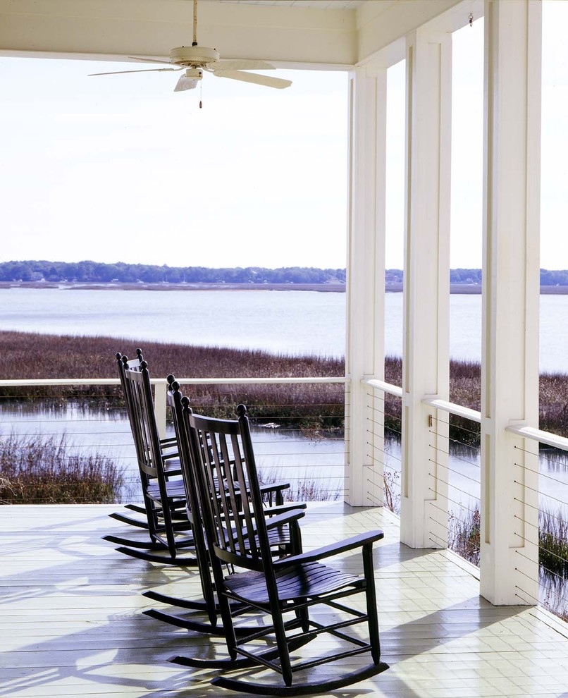 Inspiration for a coastal porch remodel in Atlanta with a roof extension