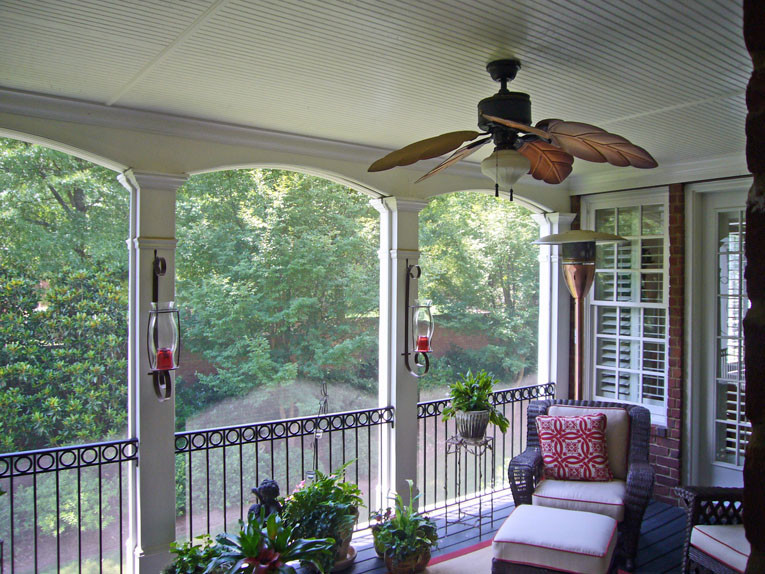 Mid-sized classic back porch idea in Atlanta with a roof extension