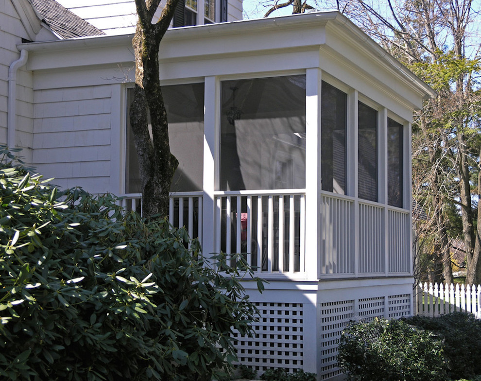 Photo of a large traditional back screened veranda in Bridgeport with decking and a roof extension.