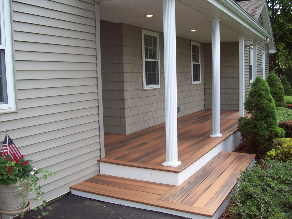 Photo of a medium sized classic front veranda in Bridgeport with decking and a roof extension.