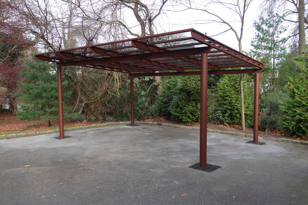 Large front veranda in New York with a pergola.