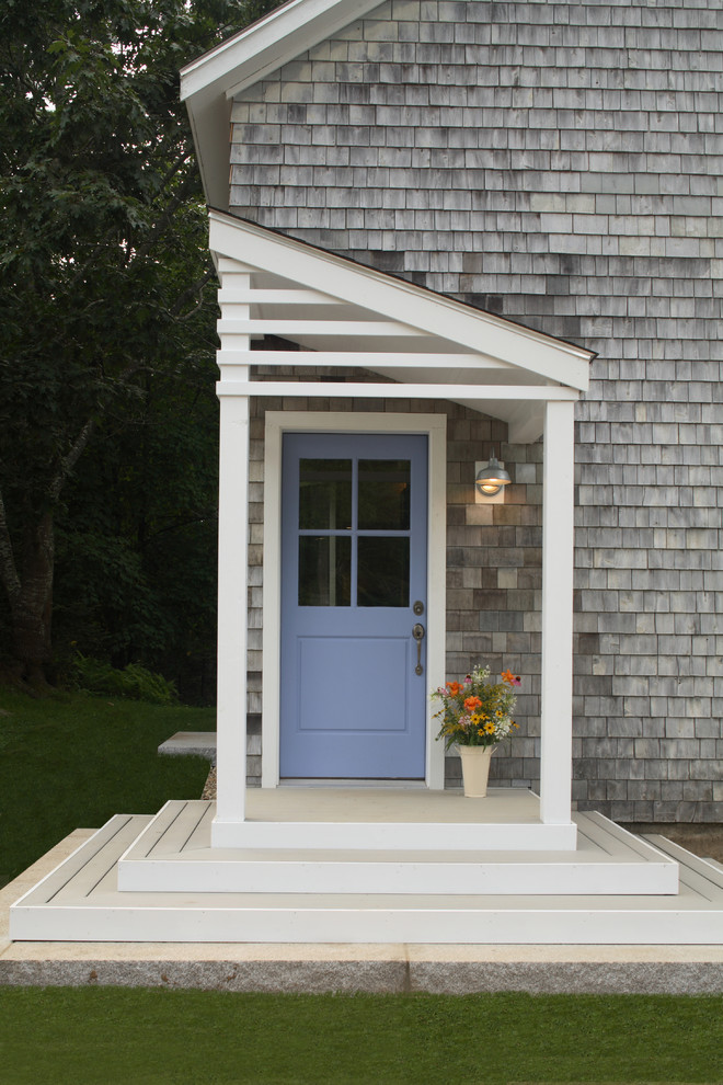 Elegant porch photo in Portland Maine with a roof extension