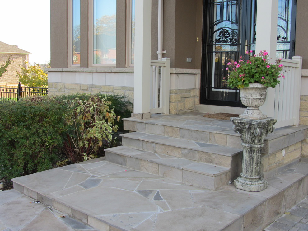 Refaced Random Flagstone Porch with Enlarged Landings and New Steps