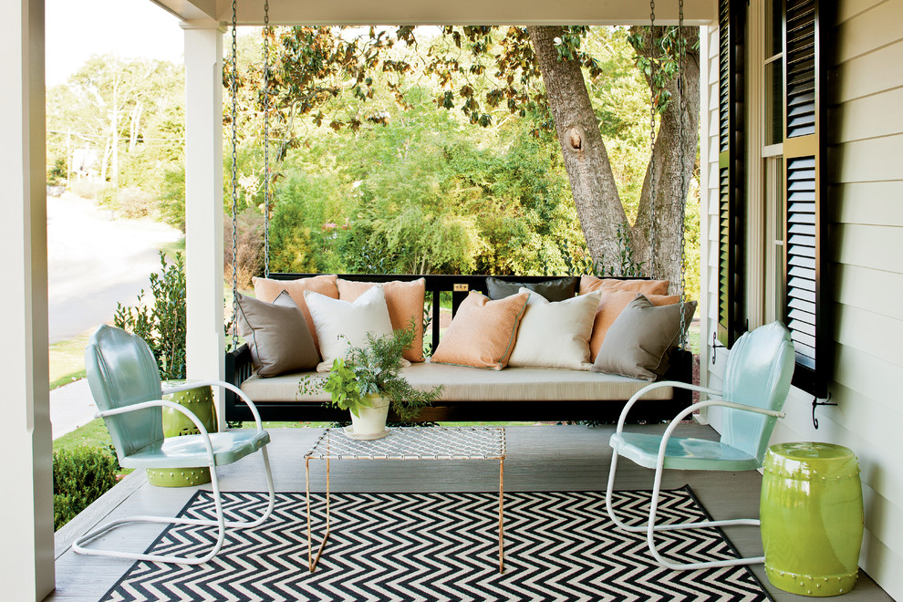 Cottage porch idea in Atlanta with decking and a roof extension