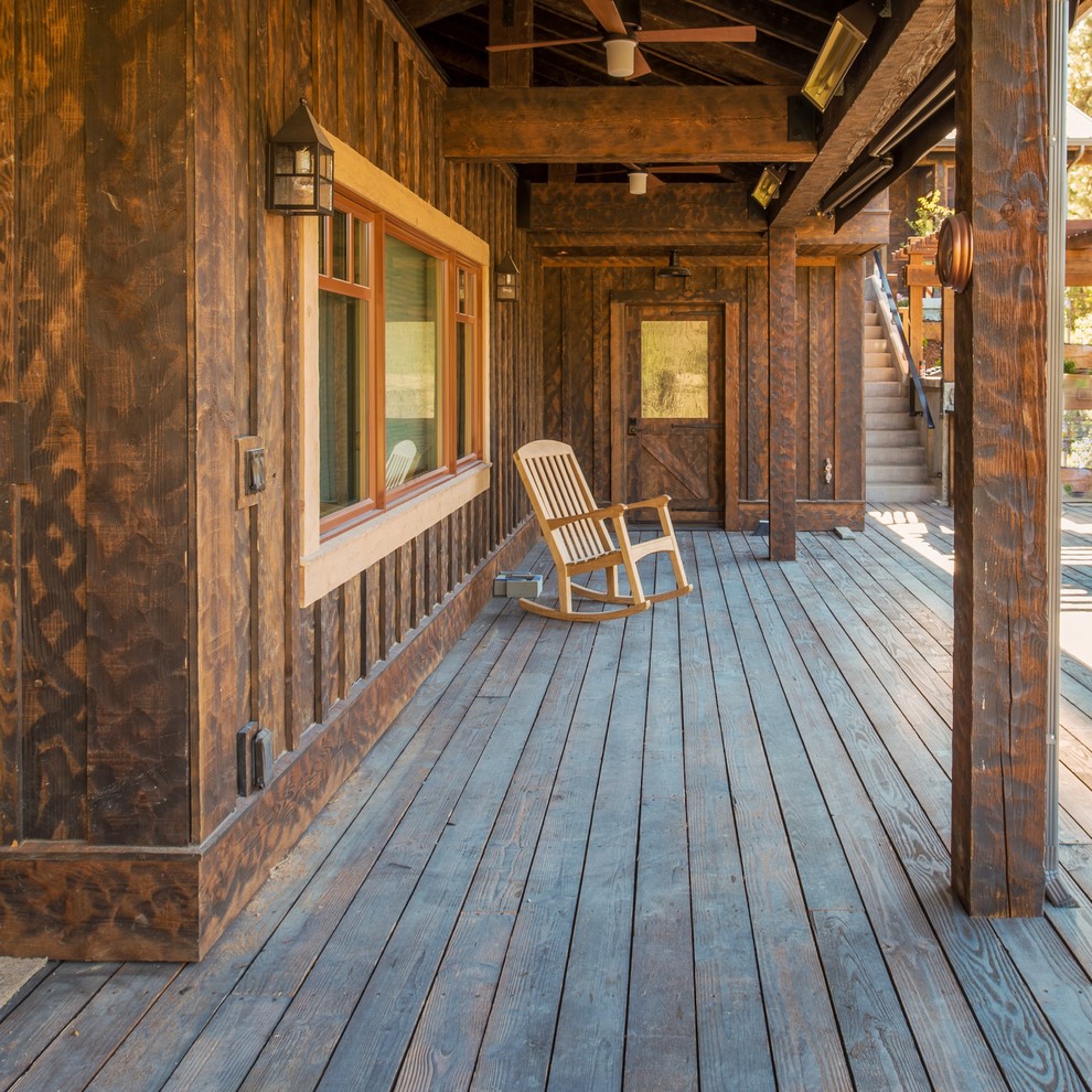 Design ideas for a rustic veranda in Boise with decking and a roof extension.