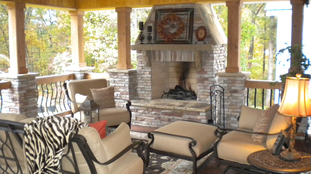 Inspiration for a timeless porch remodel in Atlanta with a fire pit