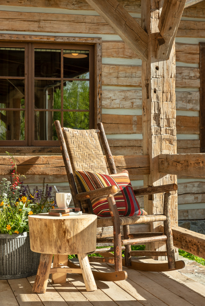 This is an example of a rustic porch design in Other with decking.