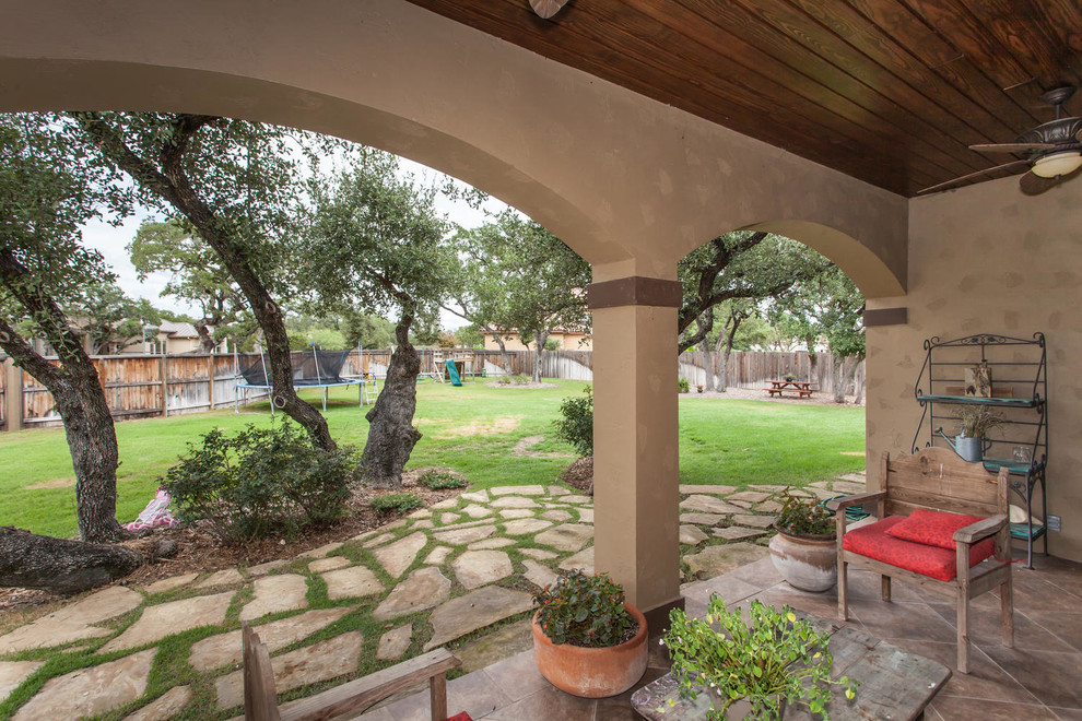 This is an example of a rustic veranda in Austin.