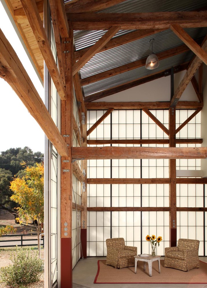 Überdachte Landhausstil Veranda mit Betonplatten in Santa Barbara