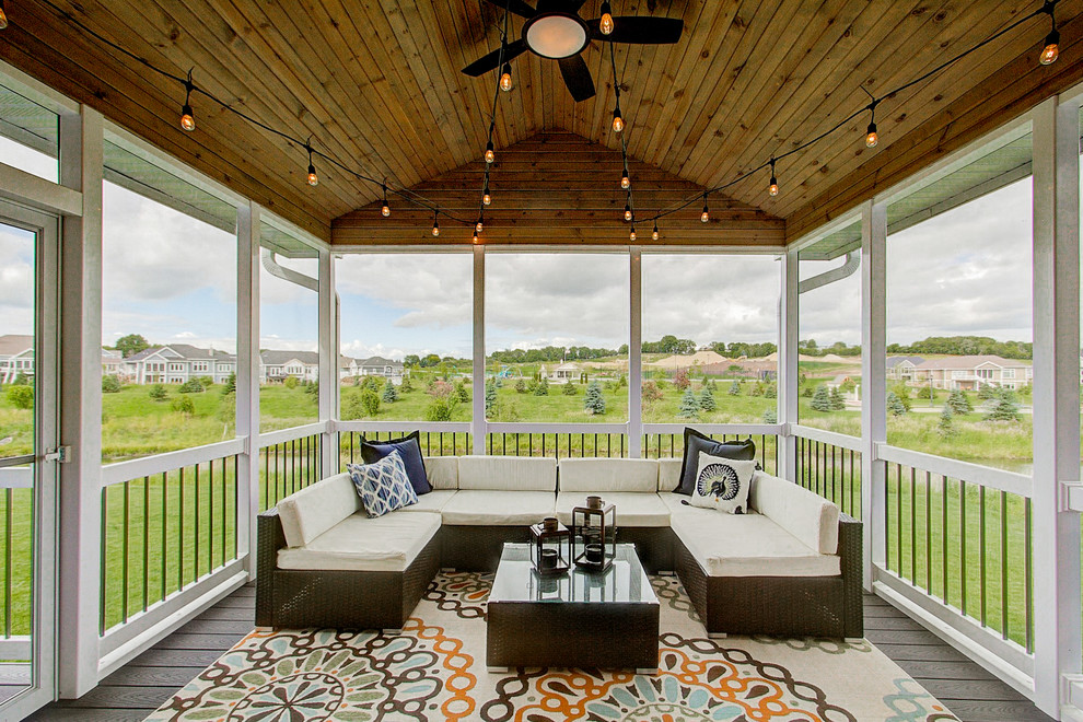 Transitional screened-in porch photo in Other with decking