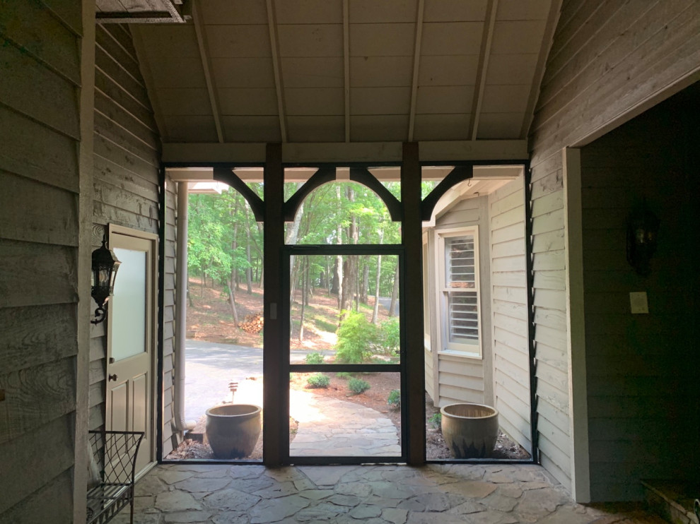 Bild på en rustik veranda