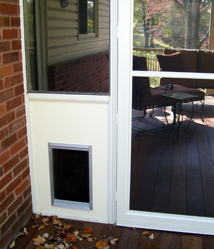 Porch screen door with dog outlet door