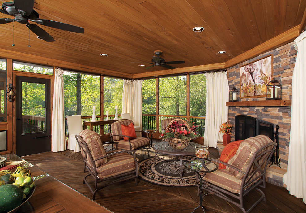 Inspiration for a classic back veranda in Atlanta with a roof extension.