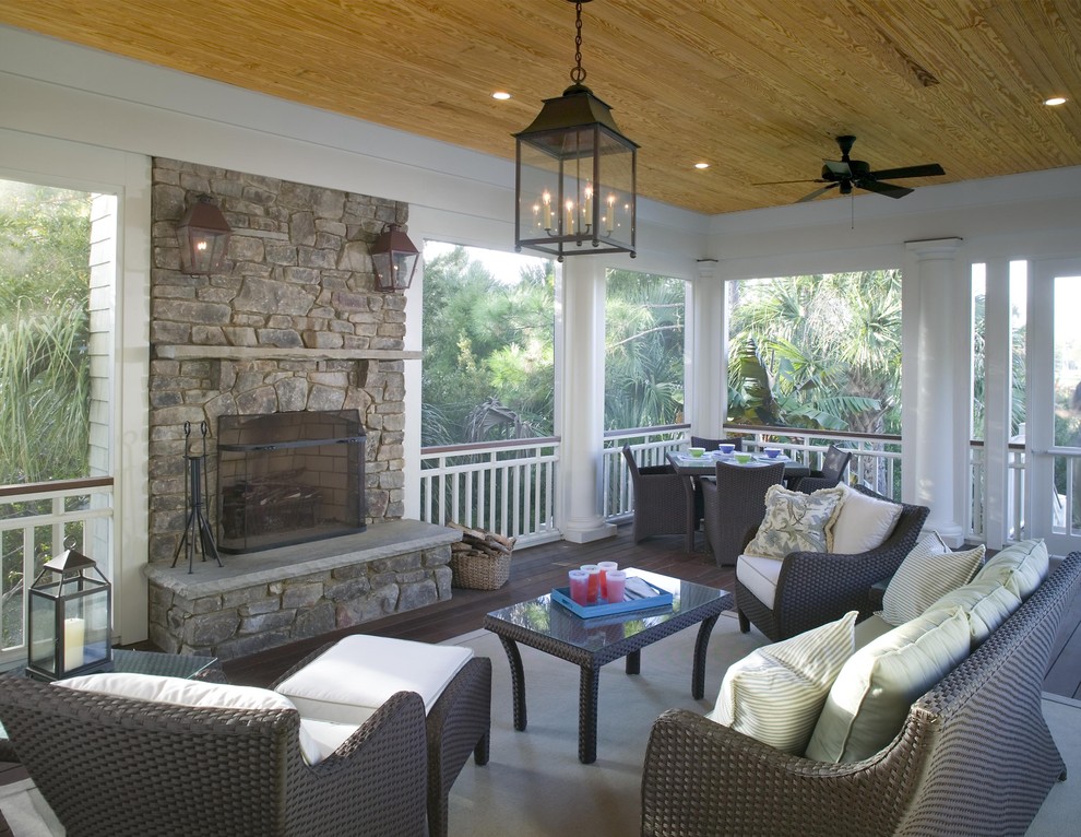 Design ideas for a classic veranda in Charleston with a fire feature and all types of cover.