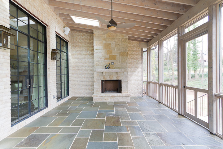 This is an example of a transitional porch design in Atlanta.