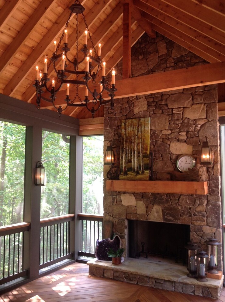 Inspiration for a medium sized classic back veranda in Atlanta with a fire feature, decking and a roof extension.