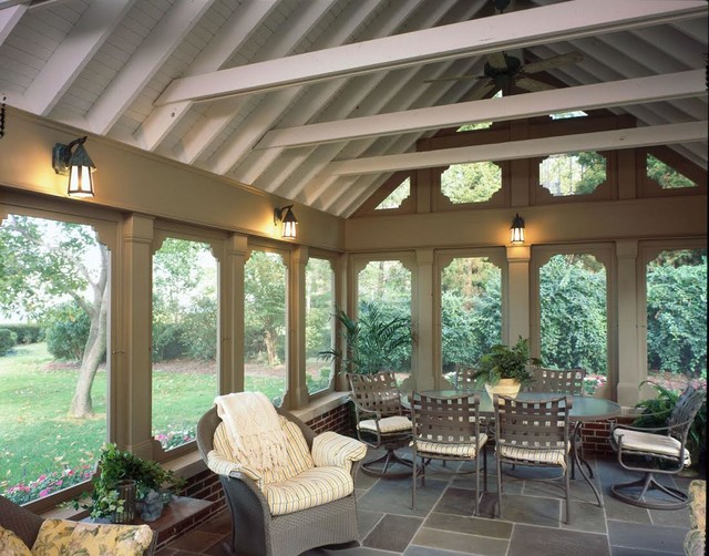 Screened Porch with lake views, vaulted ceiling and bluestone floor