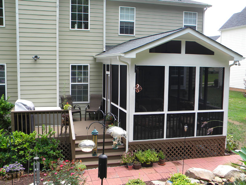 Design ideas for a small back screened veranda in Raleigh with decking and a roof extension.