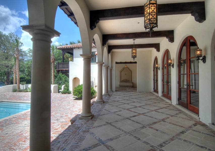 This is an example of a mediterranean porch design in Jacksonville.