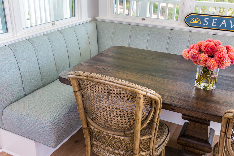 This is an example of a small nautical dining room in San Diego.