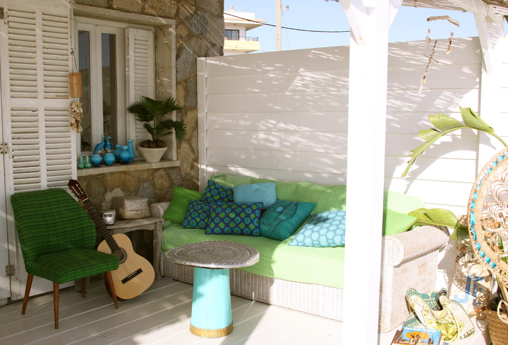 Mid-sized beach style porch photo in Palma de Mallorca with decking