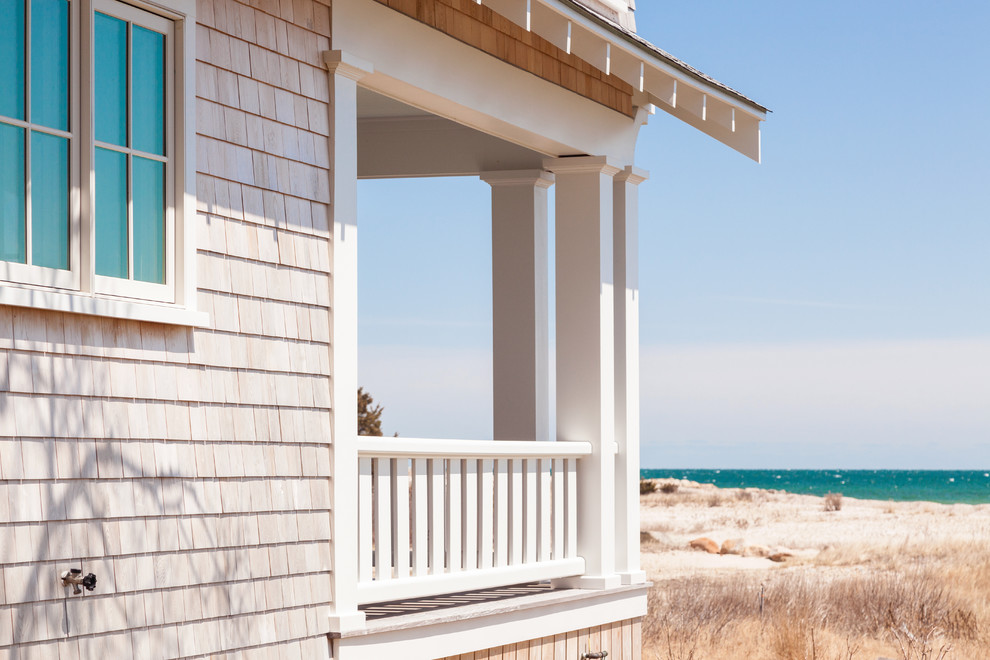 This is an example of a coastal veranda in Boston.