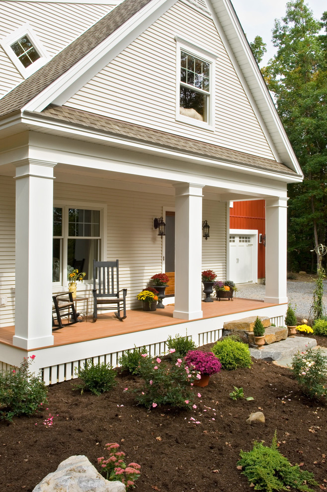 Ornate porch idea in New York with a roof extension