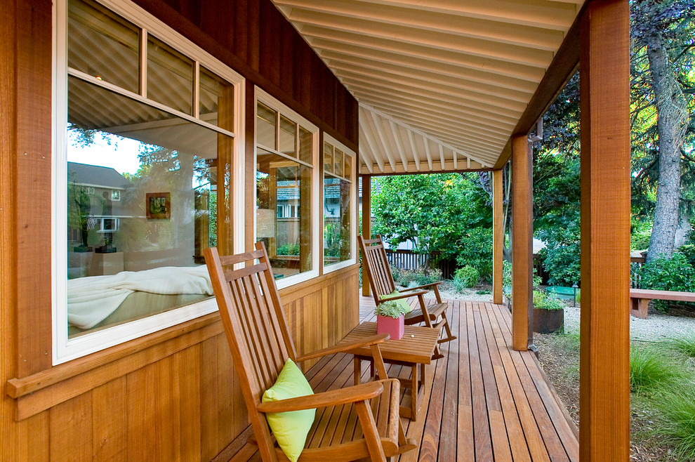 Inspiration for a rustic veranda in San Francisco with decking and a roof extension.