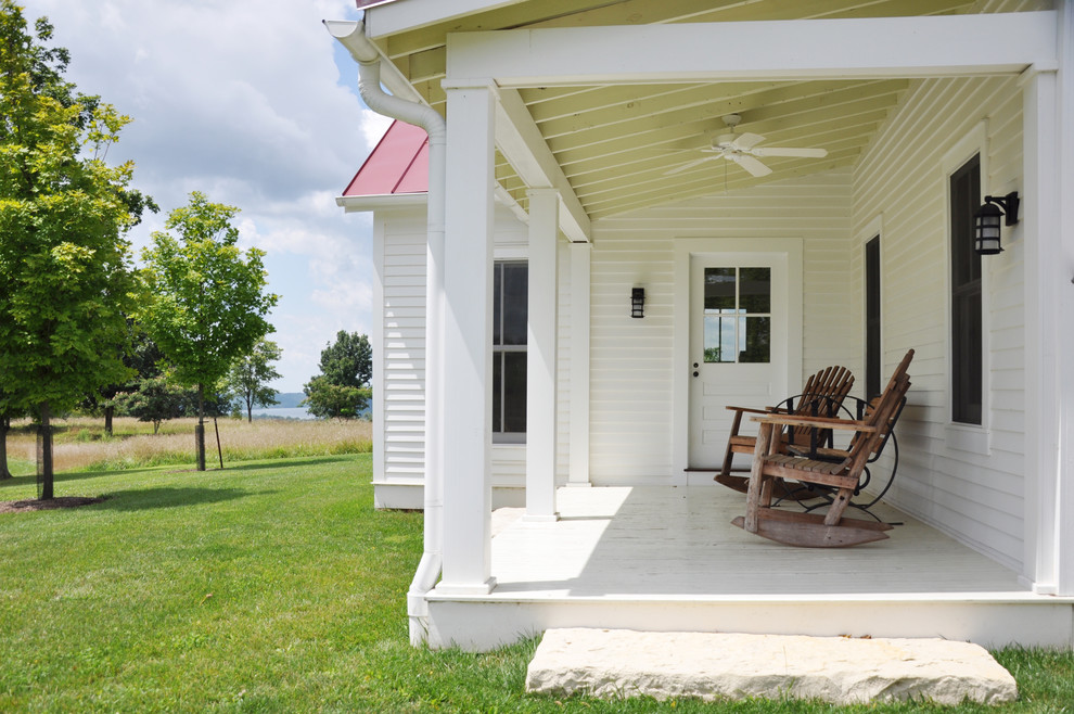This is an example of a country front porch design in Louisville.