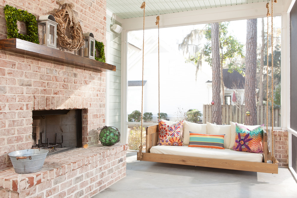 Elegant porch photo in Atlanta with a fire pit and a roof extension