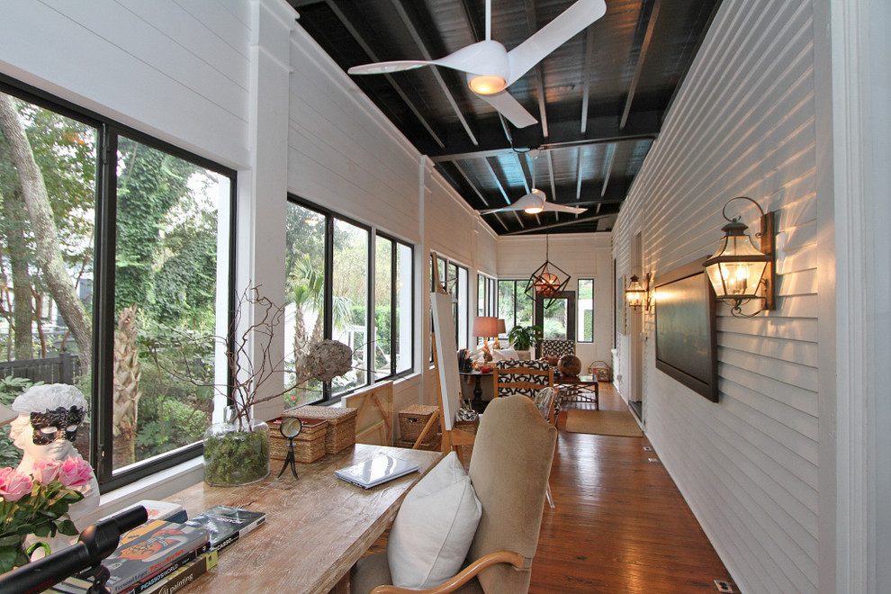 This is an example of a contemporary veranda in Charleston.