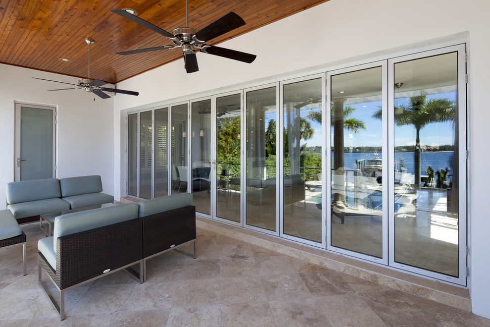This is an example of a contemporary porch design in Tampa.
