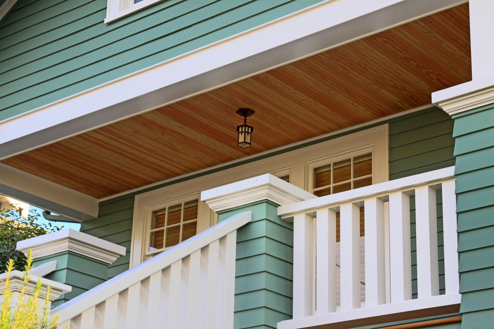 This is an example of a mid-sized traditional porch design in Seattle.