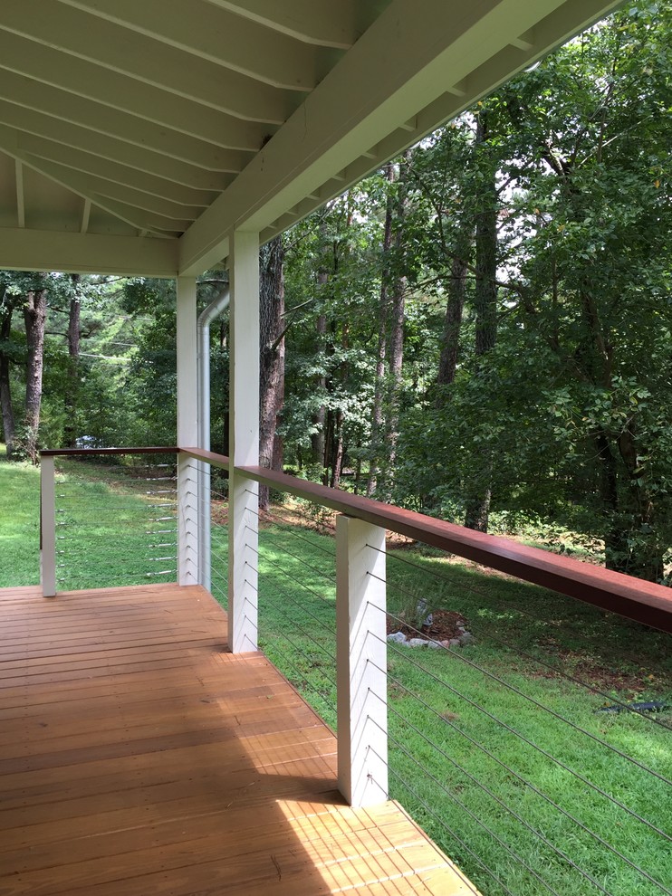 This is an example of a small modern front veranda in Raleigh.