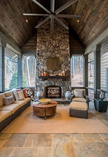 This is an example of a large rustic porch design in Atlanta.