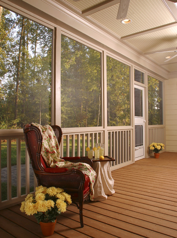 This is an example of a traditional porch design in Charlotte.