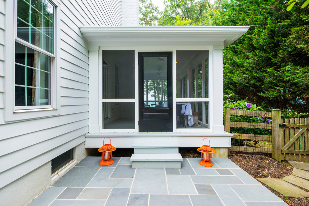 Inspiration for a timeless porch remodel in Baltimore with a roof extension