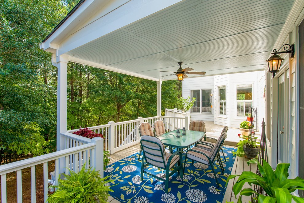 Design ideas for a medium sized traditional back veranda in Atlanta with a roof extension.