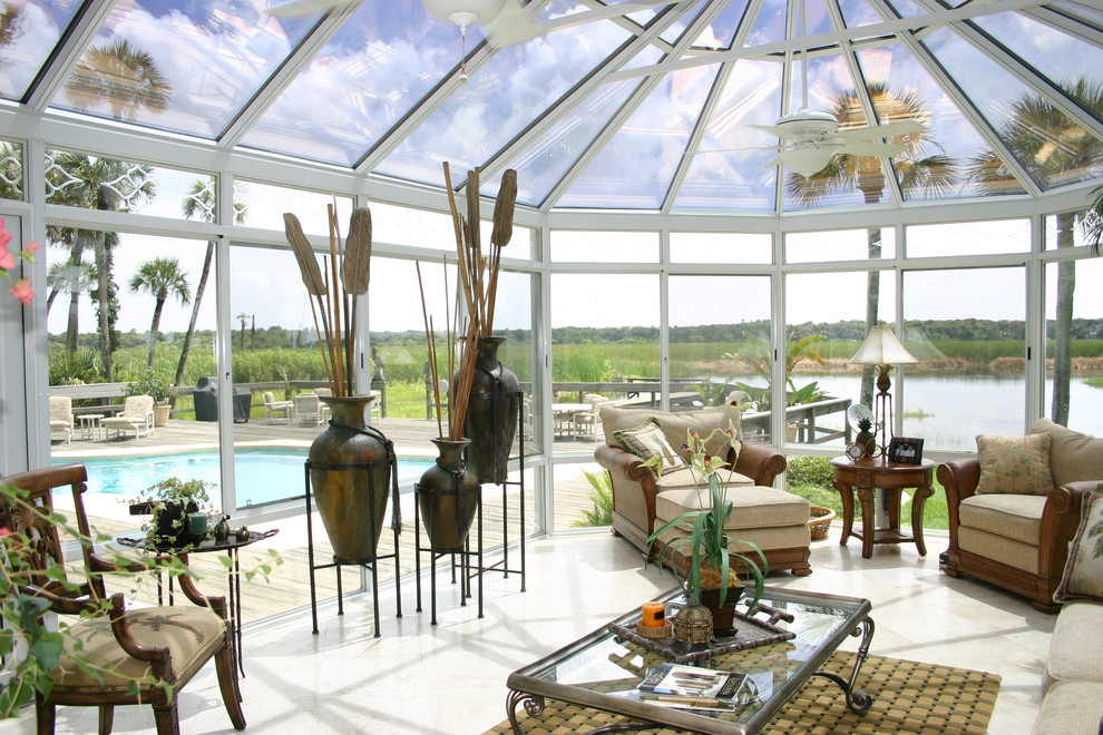 Example of an island style sunroom design in Jacksonville
