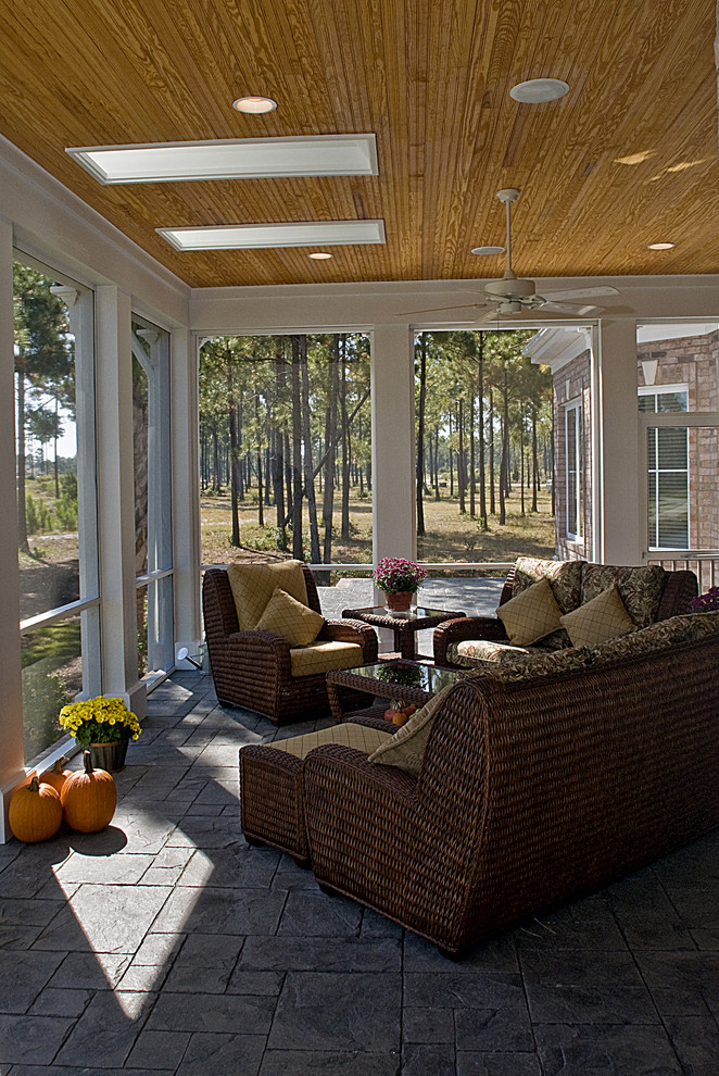 Elegant porch photo in Raleigh with a roof extension