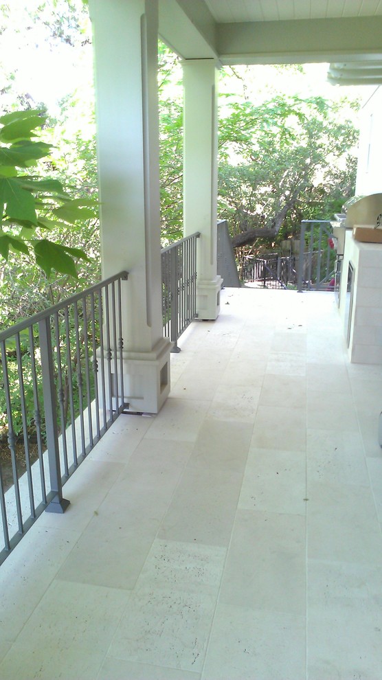 This is an example of a traditional porch design in Houston.